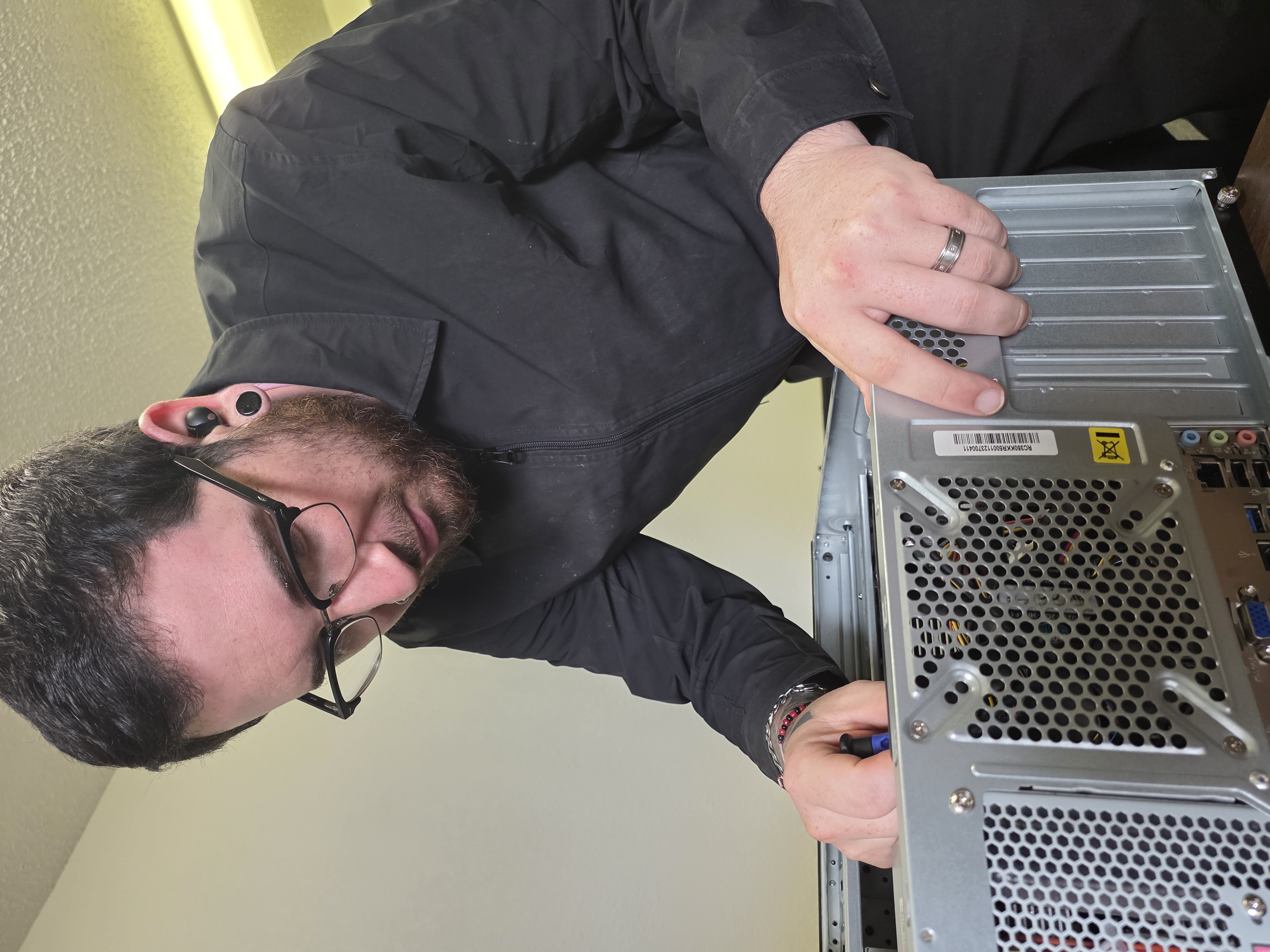 Joseph working on a network setup